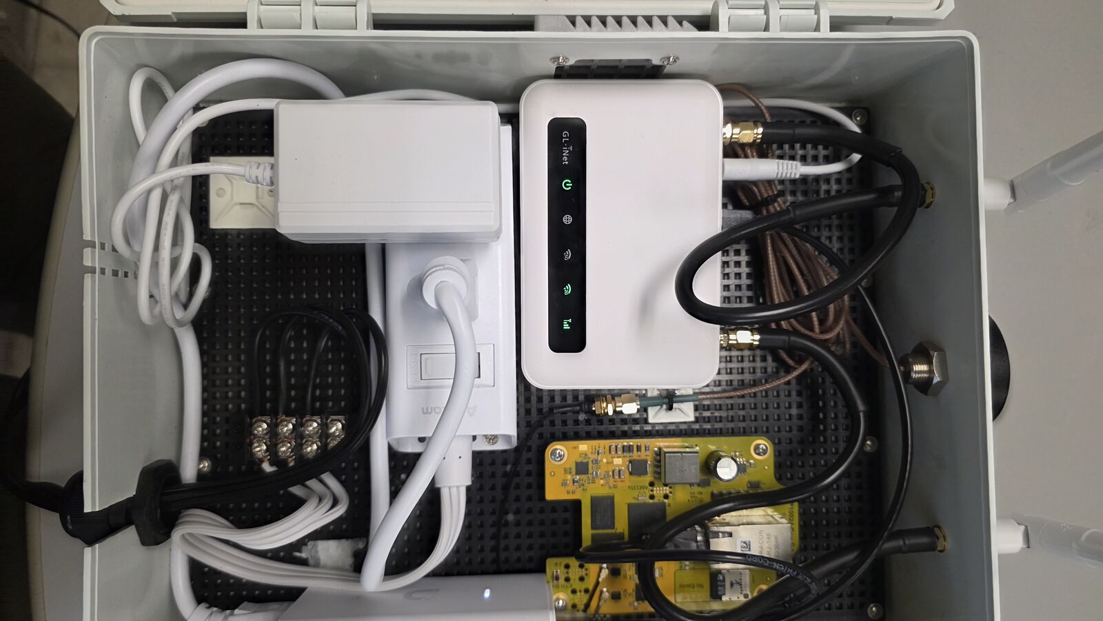 Gateway enclosure: CTC gateway card, cellular router, and power in one box